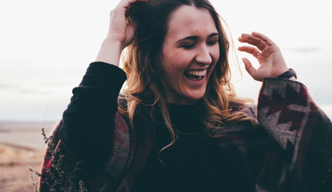 candid photography of woman with broad smile